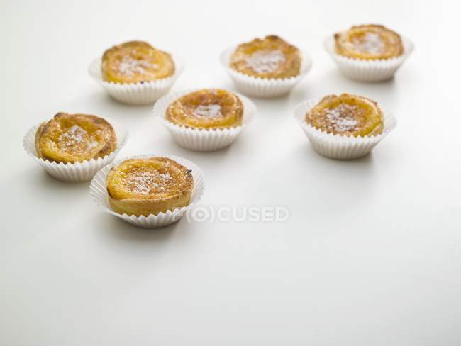 Coconut tarts in cases — Stock Photo