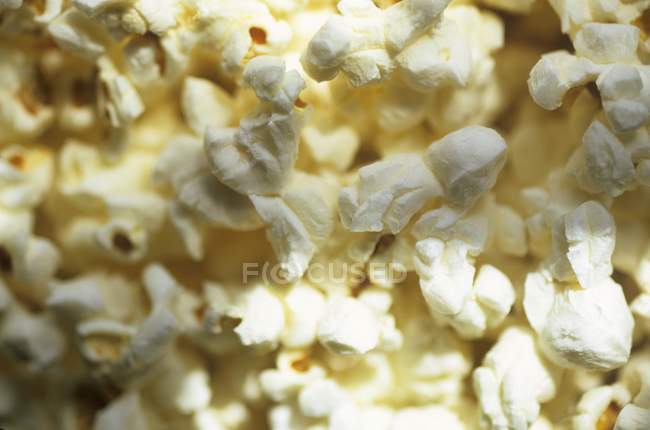 Popcorn on baking paper — Stock Photo