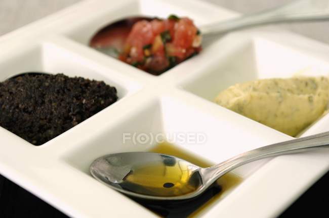 Closeup view of antipasti in sectioned dish — Stock Photo