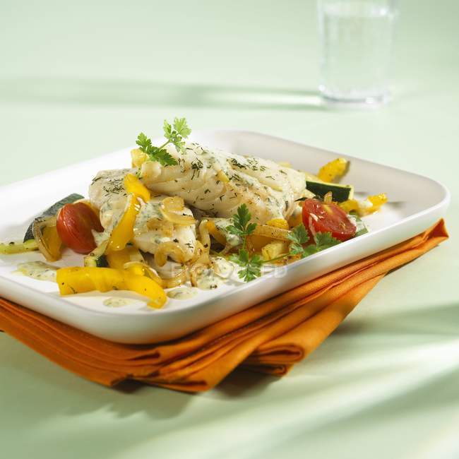 Steamed cod fillet with vegetables — Stock Photo