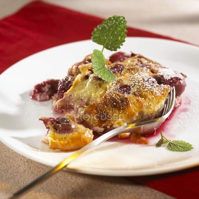 Cherry pudding on plate — Stock Photo