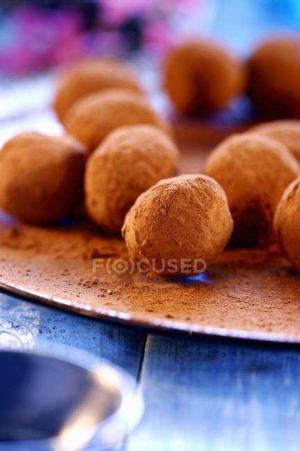 Chocolate truffles on tray — Stock Photo