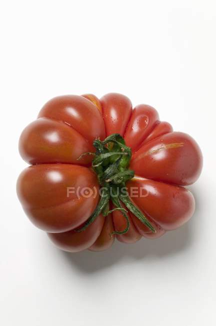 Red beefsteak tomato — Stock Photo