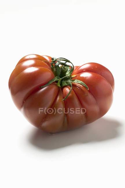 Red beefsteak tomato — Stock Photo