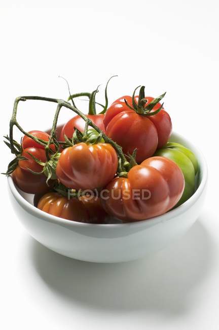 Red and green beefsteak tomatoes — Stock Photo