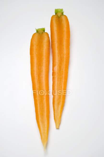 Peeled halved carrot — Stock Photo