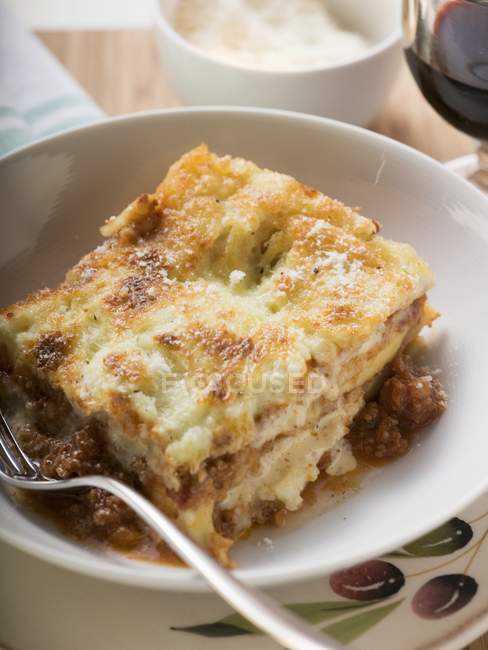 Portion of mince lasagne — Stock Photo
