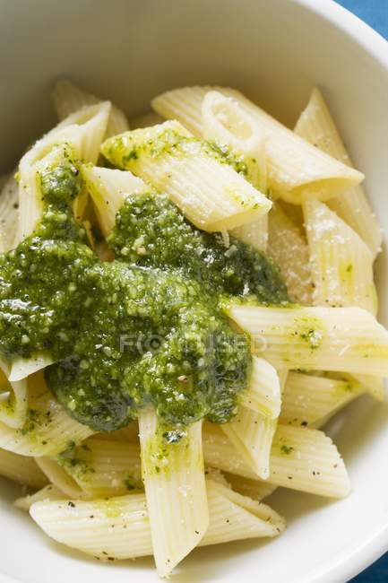 Penne pasta with pesto — Stock Photo