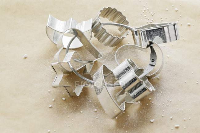 Closeup view of assorted biscuit cutters on frame — Stock Photo