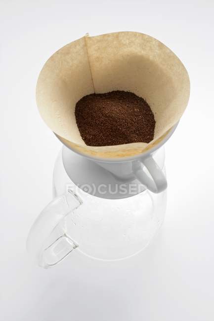 Ground coffee in filter — Stock Photo