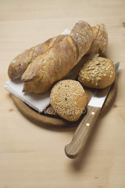 Baguettes and wholemeal rolls — Stock Photo