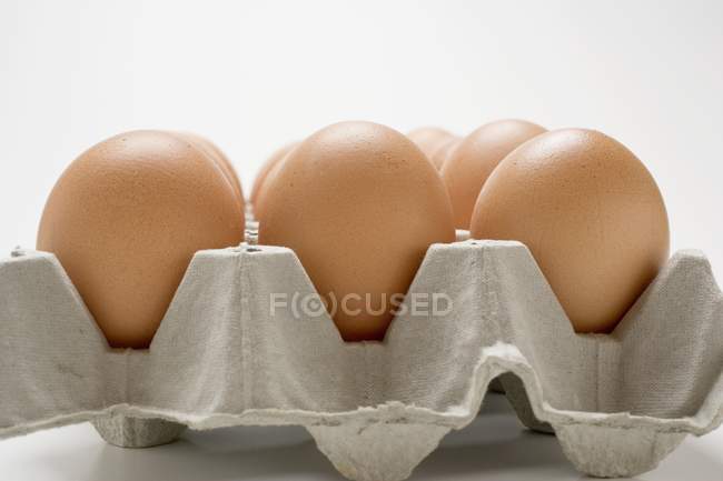 Chicken eggs in cardboard box — Stock Photo