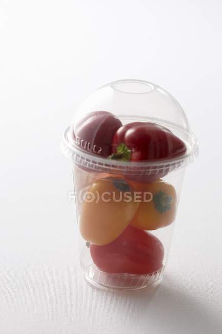 Peppers in plastic cup — Stock Photo