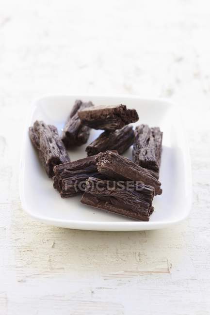 Barres de chocolat écaillées — Photo de stock