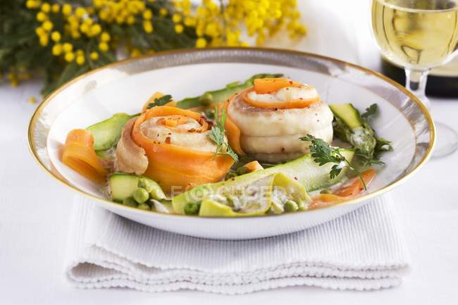Sole rolls with spring vegetables — Stock Photo