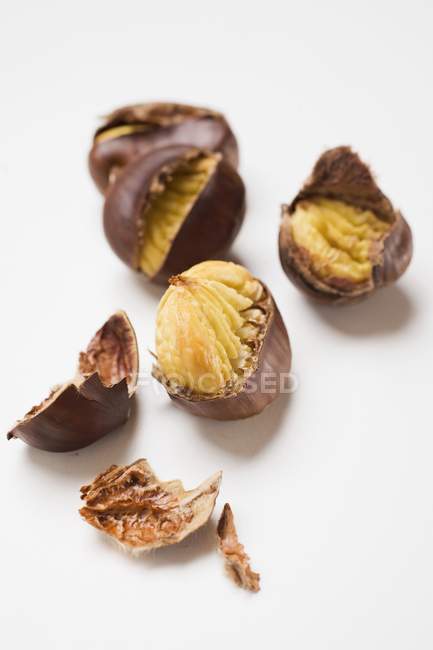 Several roasted chestnuts — Stock Photo