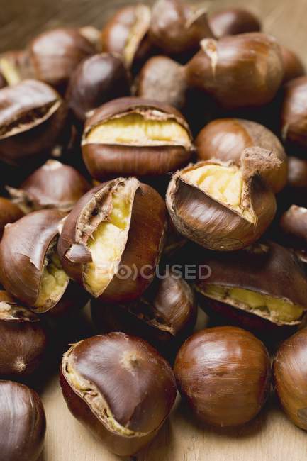 Several roasted chestnuts — Stock Photo