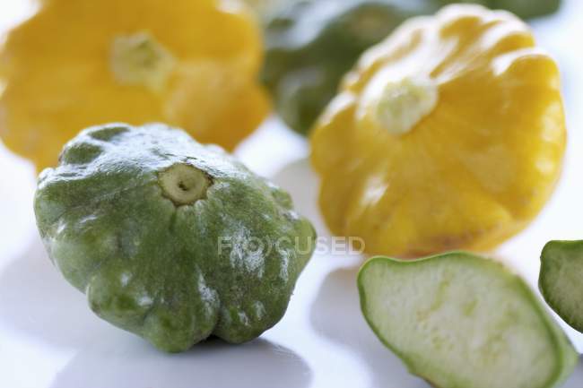 Green and yellow patty pan squashes — Stock Photo