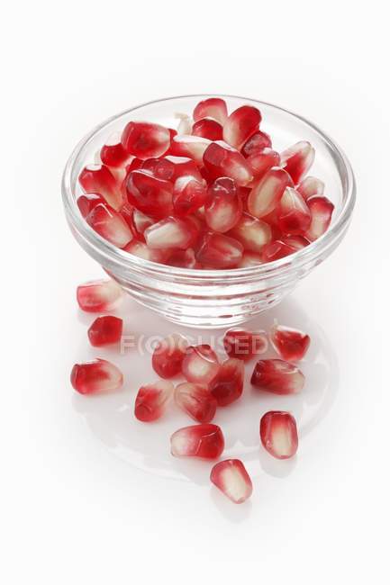 Pomegranate seed in glass bowl — Stock Photo
