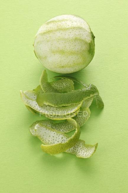 Lime and lime peel — Stock Photo