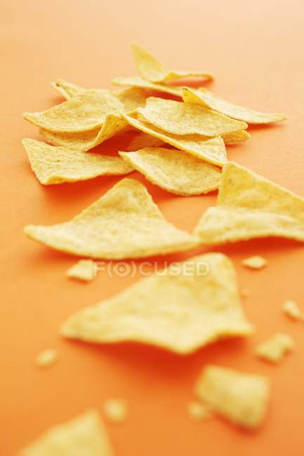 Tortilla chips with crumbles — Stock Photo