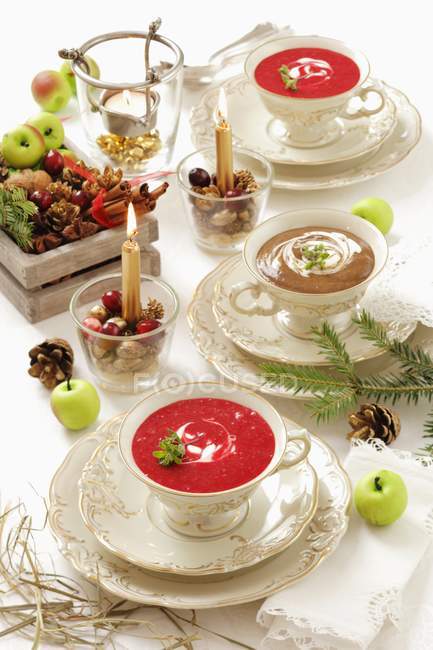 Cream of beetroot soup and cream of mushroom soup for Christmas dinner — Stock Photo