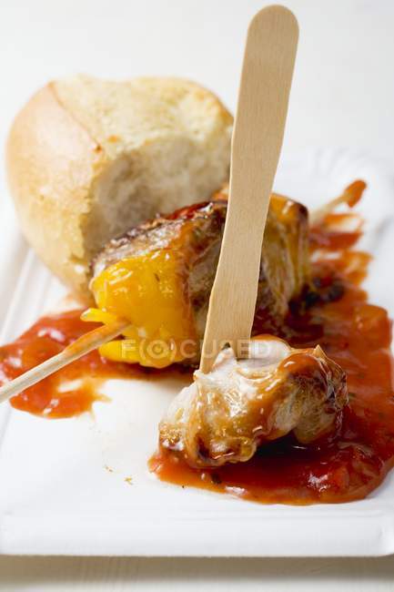 Shashlik with bread roll — Stock Photo