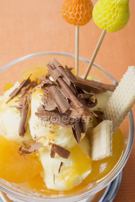 Apricots and chocolate shavings — Stock Photo