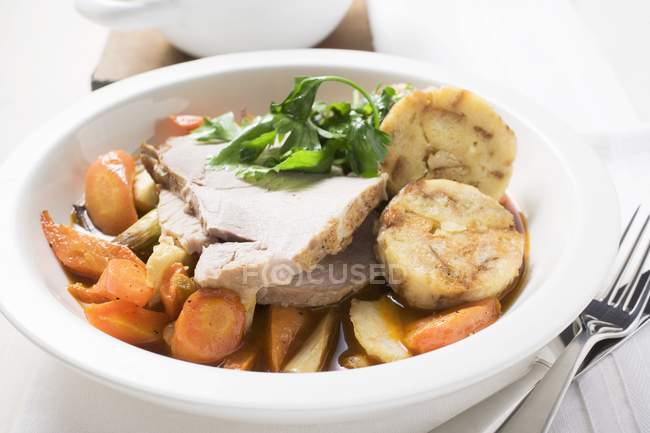 Roast pork with carrots — Stock Photo