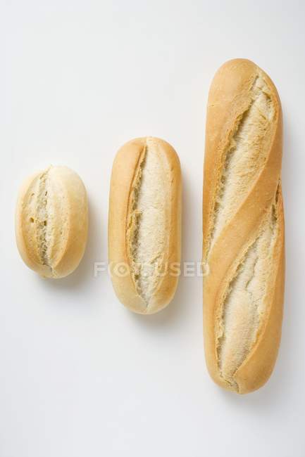 Freshly baked baguette rolls — Stock Photo