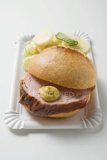 Leberkase in buns and potato salad — Stock Photo