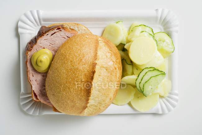 Leberkase in buns and potato salad — Stock Photo