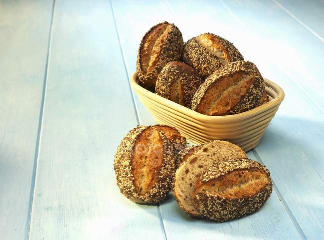 Spelt rolls in bread basket — Stock Photo