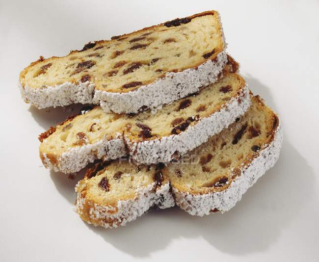 Slices of christmas stollen — Stock Photo