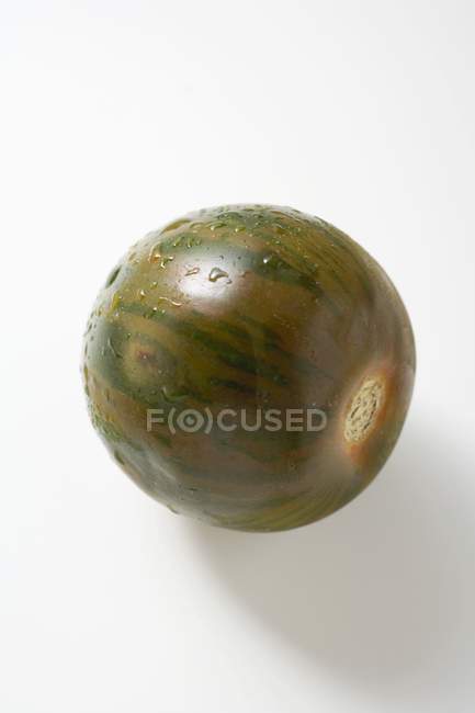 Зелений смугастий томатний — стокове фото