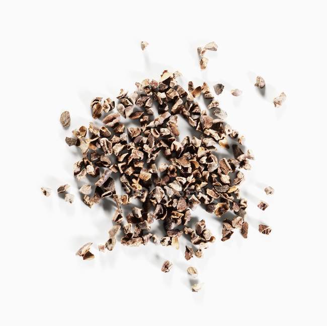 Частично раздавленные кофейные зерна — стоковое фото