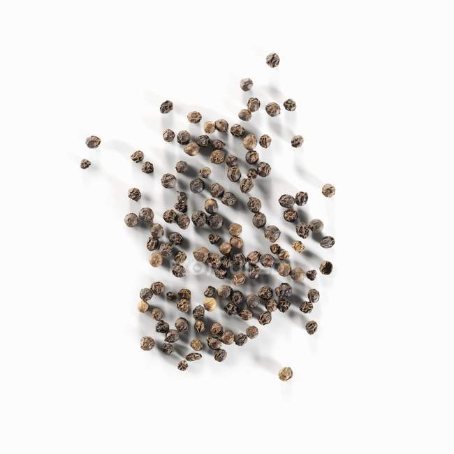 Чёрный сушеный перец — стоковое фото