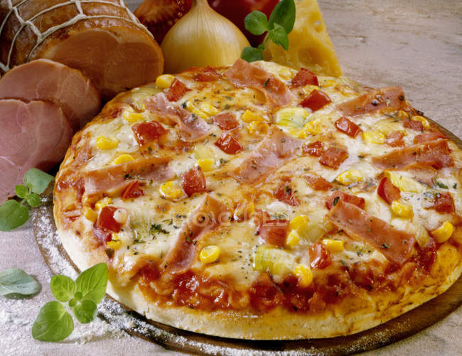 Pizza with sweetcorn and ham — Stock Photo