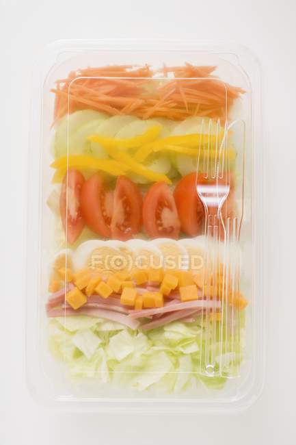 Vegetables in plastic tray — Stock Photo