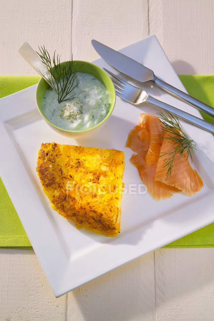 Rosti potato triangle with salmon — Stock Photo