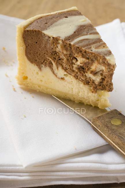 Piece of marble cheesecake — Stock Photo