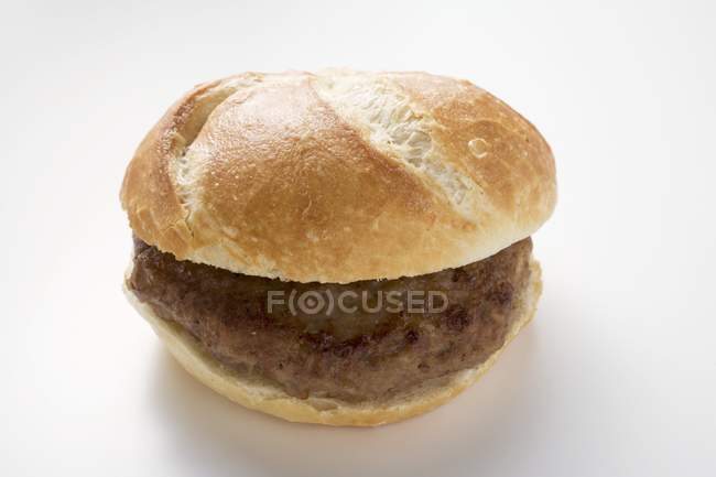 Burger in bread roll — Stock Photo