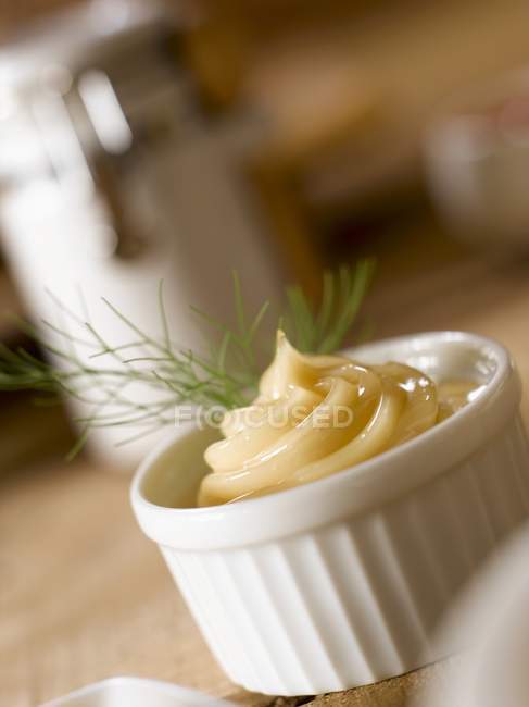 Closeup view of mayonnaise with dill in a white bowl — Stock Photo