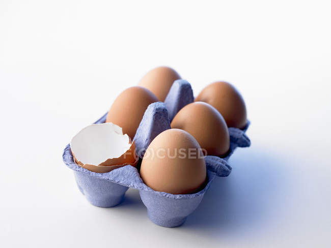 Chicken eggs in cardboard box — Stock Photo