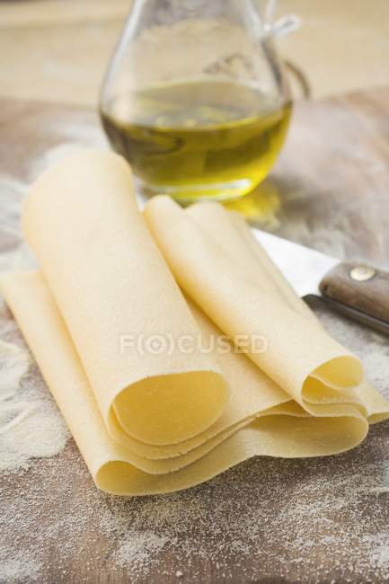Homemade pasta dough on table — Stock Photo