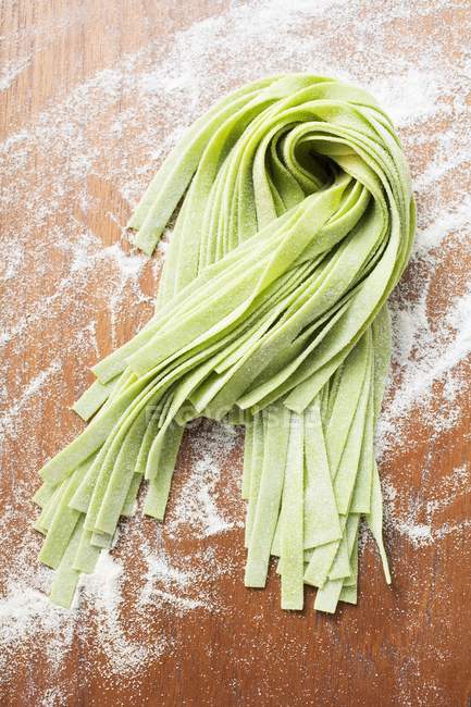 Homemade green ribbon pasta — Stock Photo