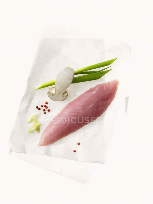 Raw turkey fillet and vegetables — Stock Photo