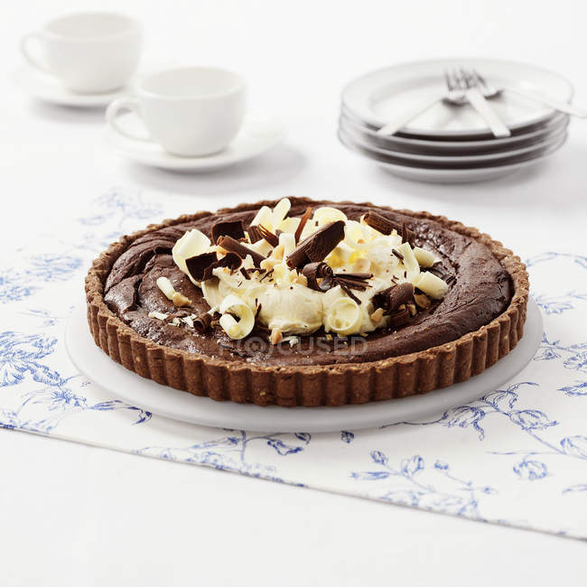 Chocolate tart with hazelnut base — Stock Photo
