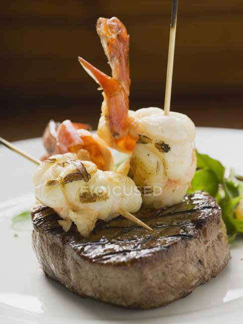 Seafood and beef steak — Stock Photo