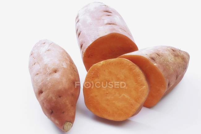 Raw sweet potatoes — Stock Photo